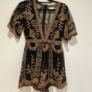 Black patterned deep V romper